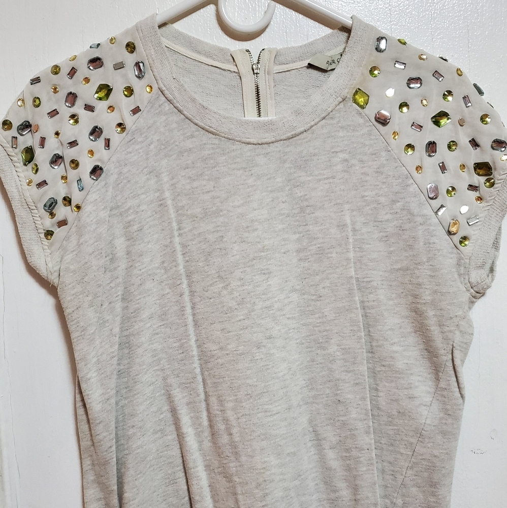 Embellished shoulder top.
